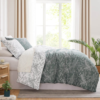 Side View of Wild Winter Reversible Comforter Set in Teal#color_wild-winter-teal-with-white-flowers