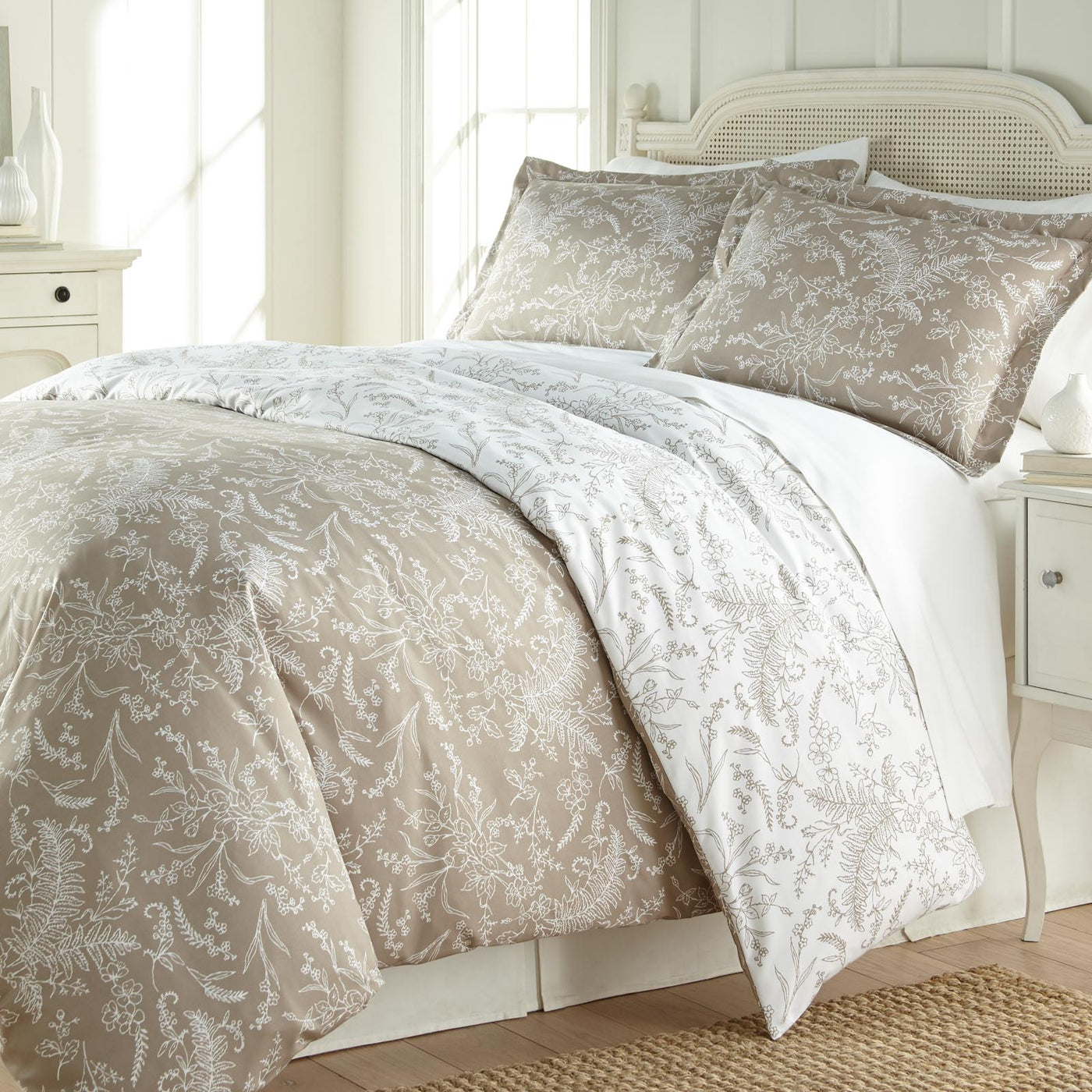 Angled View of Wild Winter Reversible Comforter Set in Warm Sand#color_wild-winter-warm-sand-with-white-flowers