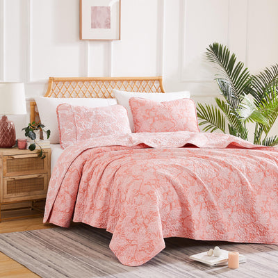 Angled View of Sacred Journey Quilt Set in Coral Haze#color_sacred-journey-coral-haze