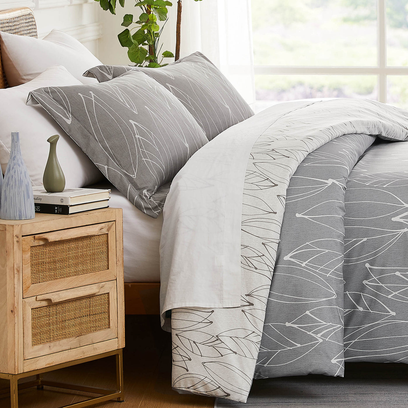 Side View of Contemporary Leaves Reversible Comforter Set in Grey#color_contemporary-leaves-grey