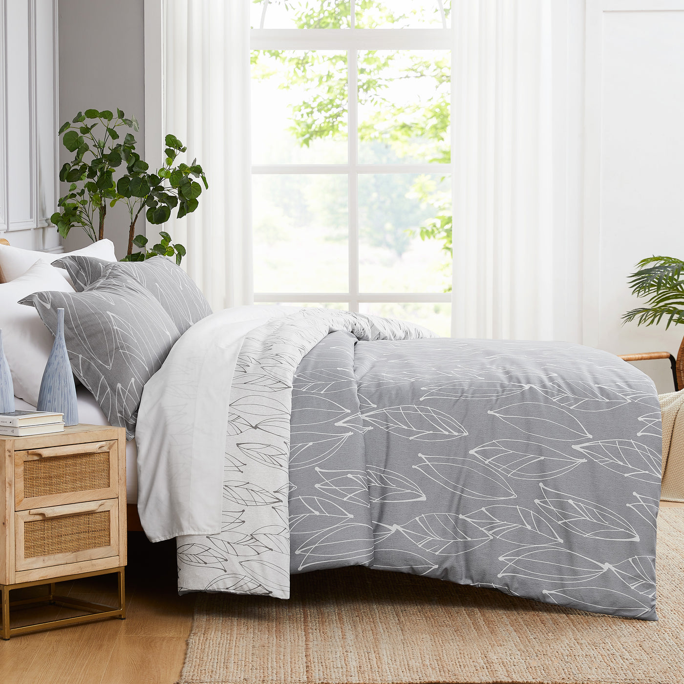 Side View of Contemporary Leaves Reversible Comforter Set in Grey#color_contemporary-leaves-grey