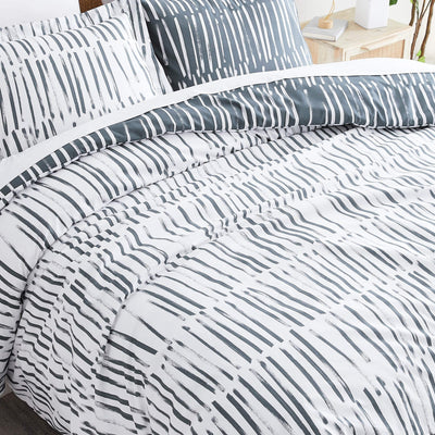 Angled Top View of Spirit Reversible Comforter Set #color_spirit-charcoal