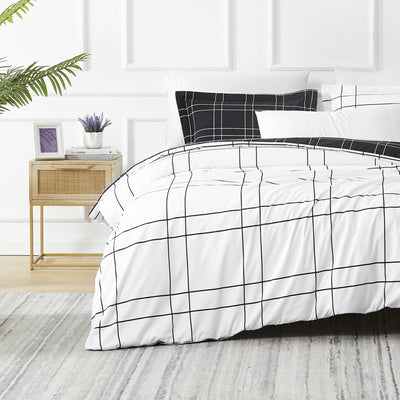 Front View of Modern Check Reversible Down Alternative Comforter Set in Black #color_modern-check-black