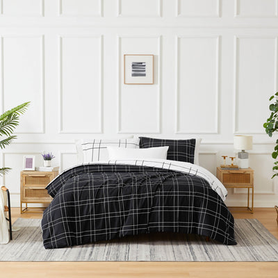 Front View of Modern Check Reversible Down Alternative Comforter Set in Black #color_modern-check-black