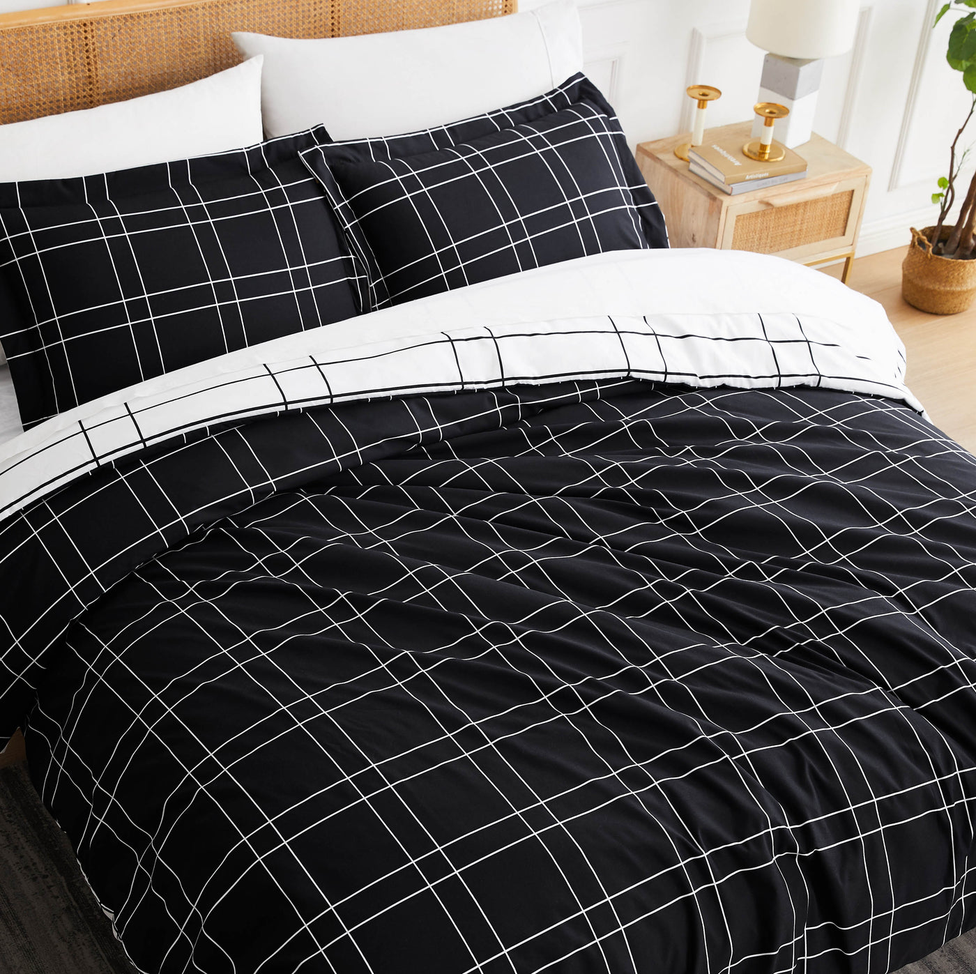 Angled Top View of Modern Check Reversible Down Alternative Comforter Set in Black #color_modern-check-black