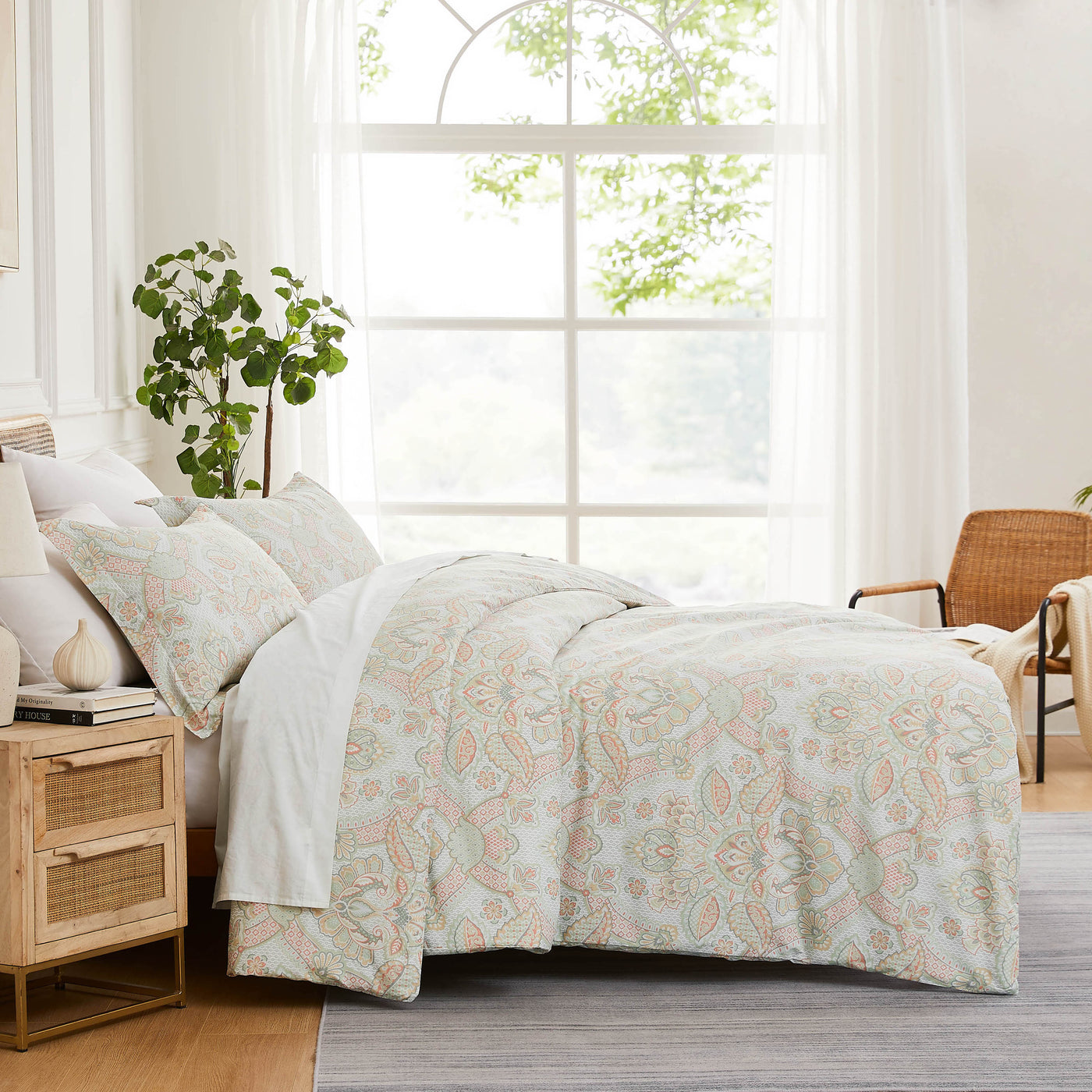 Side View of Bluebell Paisley Duvet Cover Set in Coral#color_bluebell-paisley-coral