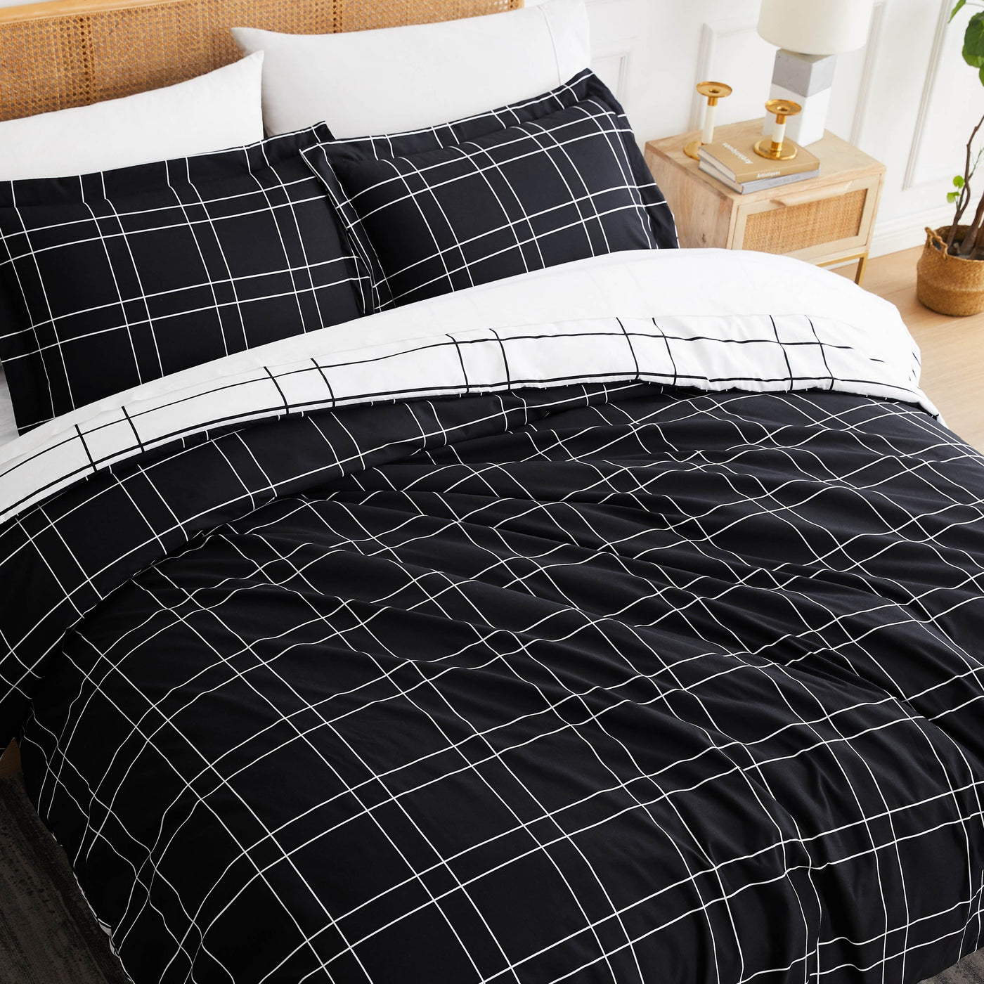 Angled Top View of Modern Check Reversible Duvet Cover Set in Black #color_modern-check-black