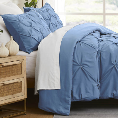 Side View of Pinch Pleated Pintuck Duvet Cover Set in Coronet Blue#color_pintuck-coronet-blue