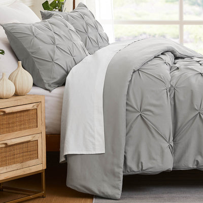 Side View of Pinch Pleated Pintuck Duvet Cover Set in Steel Grey#color_pintuck-steel-grey