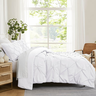 Side View of Pinch Pleated Pintuck Duvet Cover Set in White#color_pintuck-white