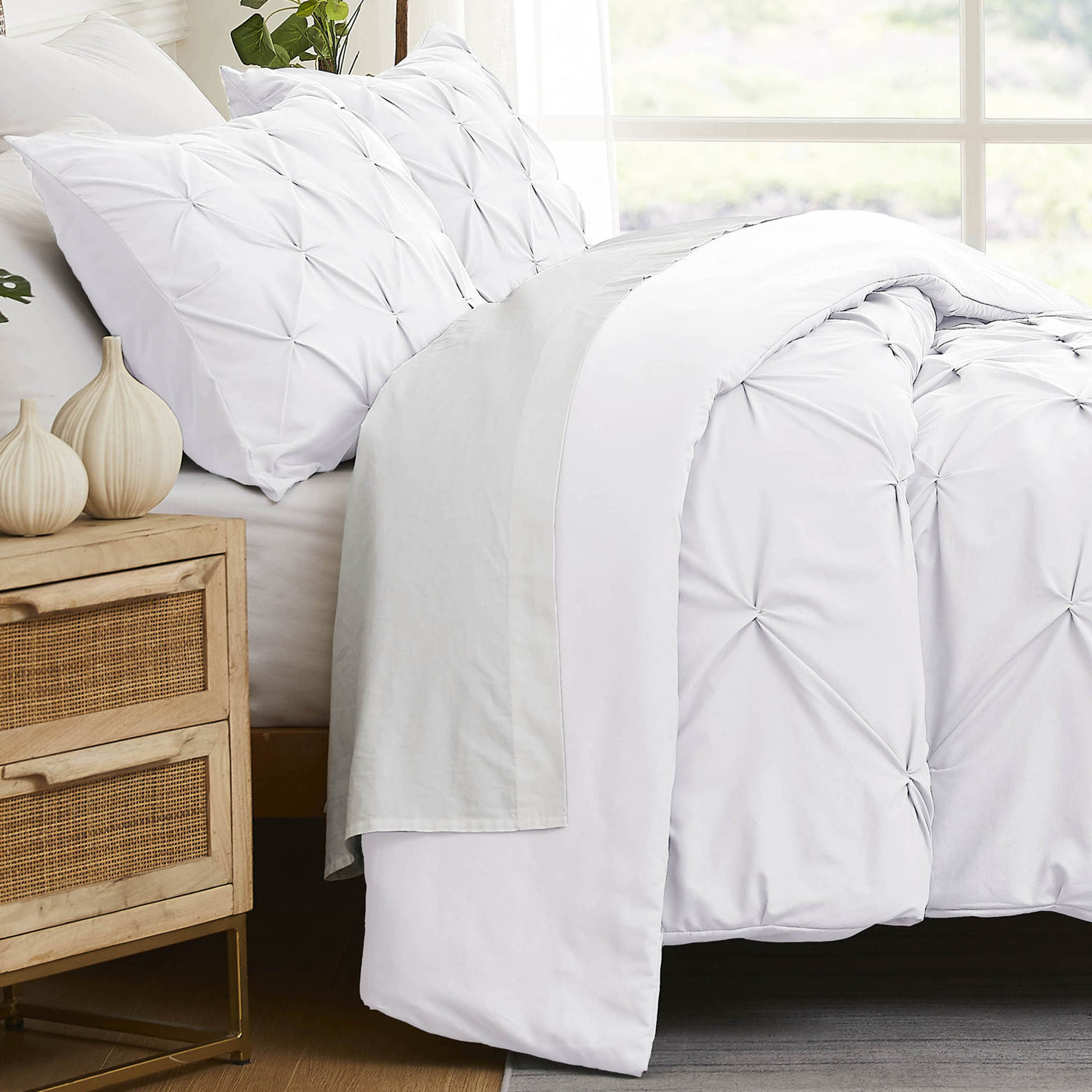 Side View of Pinch Pleated Pintuck Duvet Cover Set in White#color_pintuck-white