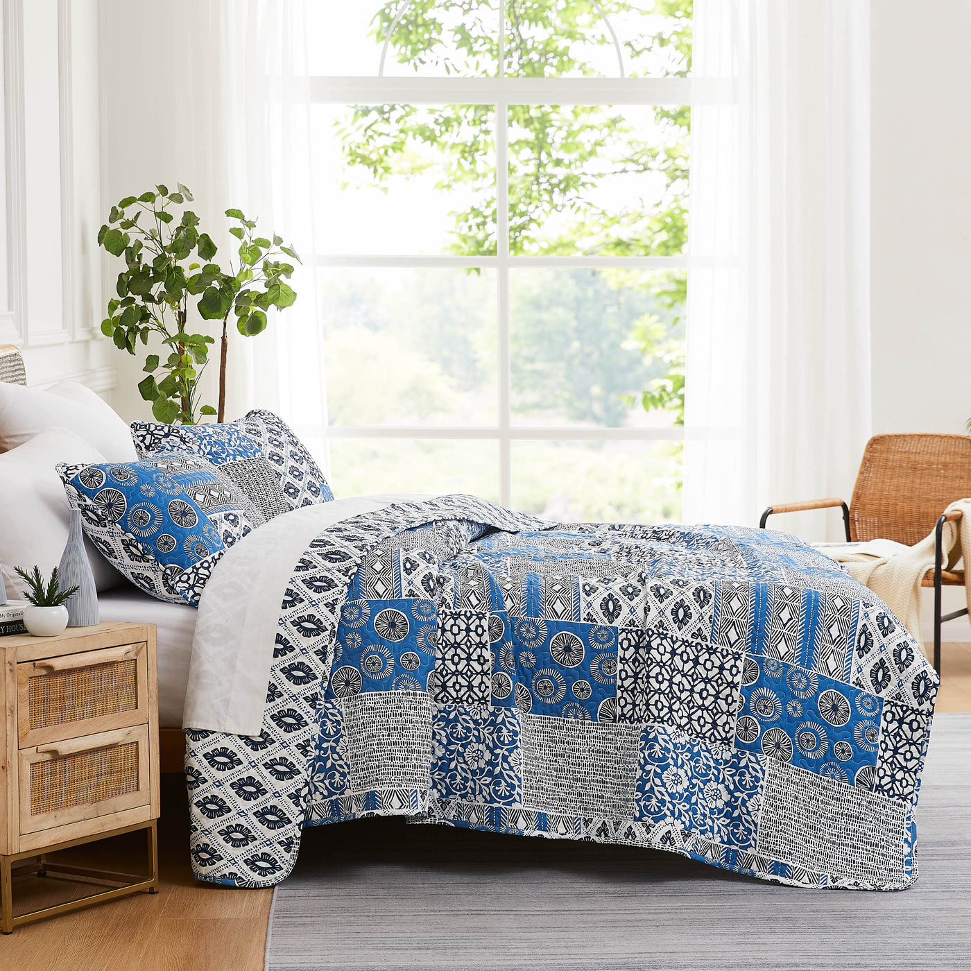 Side View of World Song Quilt Set in Blue#color_world-song-blue