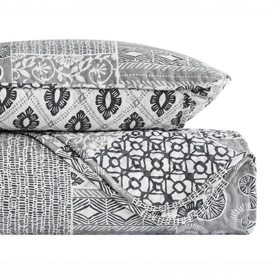 Stack Image of World Song Quilt Set in Grey#color_world-song-grey
