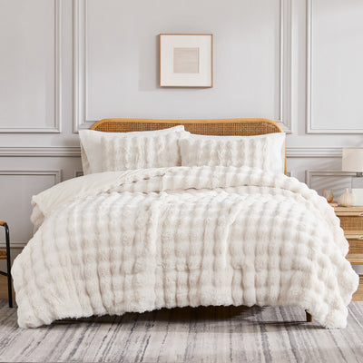 Front view of Luxe Faux Fur Comforter Set showing oversized ribbed ivory faux fur and matching shams