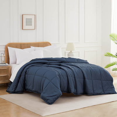 Angled View of Down Alternative Comforter in dark-blue#color_dark-blue