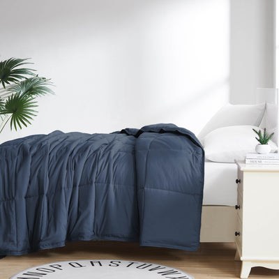 Side View of Down Alternative Comforter in dark-blue#color_dark-blue