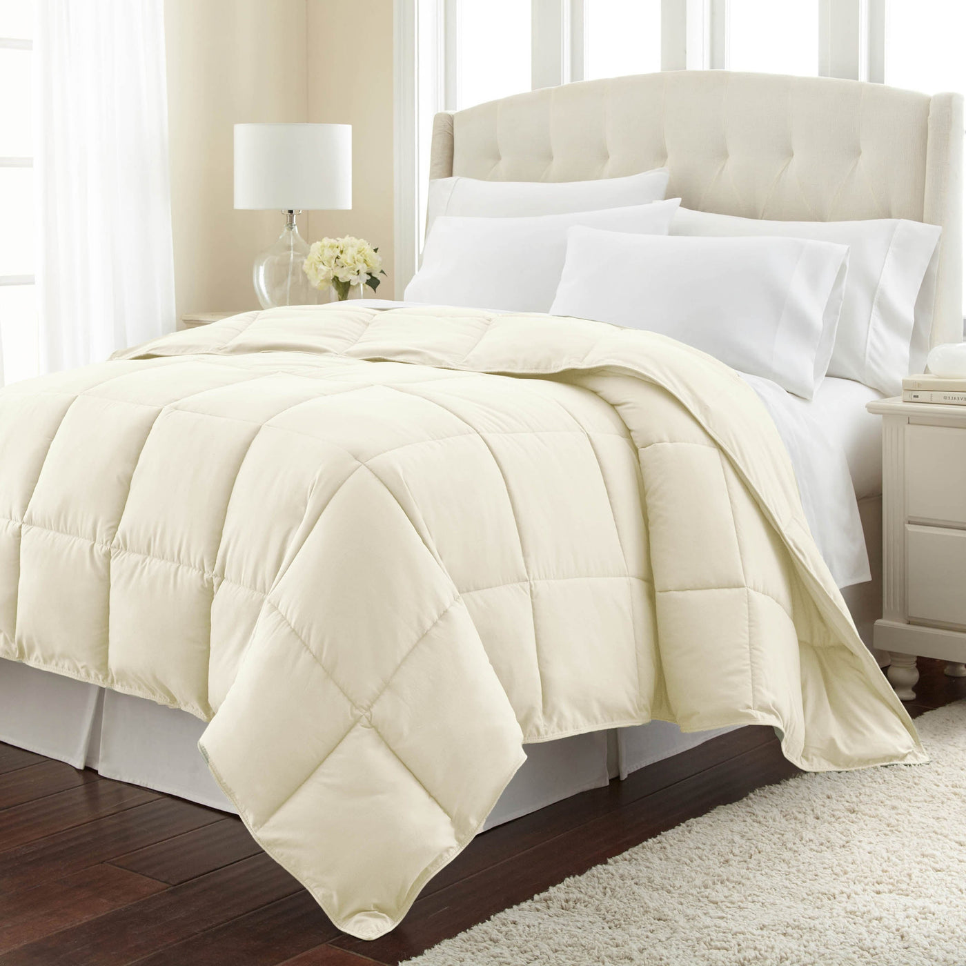 Angled View of Down Alternative Comforter in off-white#color_off-white