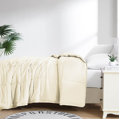 Side View of Down Alternative Comforter in off-white#color_off-white