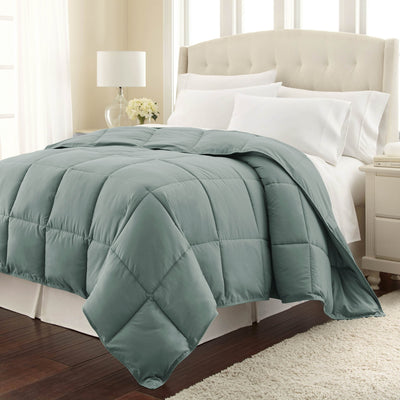 Angled View of Down Alternative Comforter in steel-blue#color_steel-blue