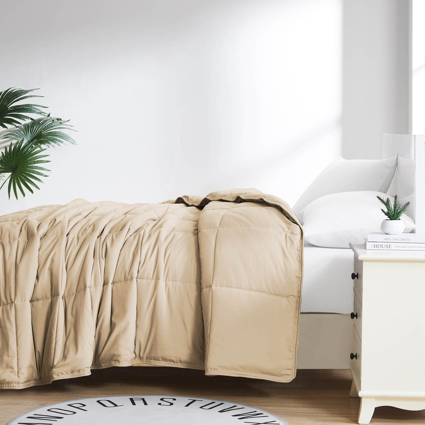 Side View of Down Alternative Comforter in taupe#color_taupe