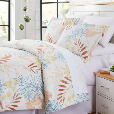 Angled View of Palm Leaf Duvet Cover Set in cream#color_palm-leaf-cream