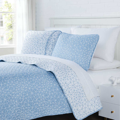 Angled View of Lala Land Quilt Set in Blue#color_lala-land-blue