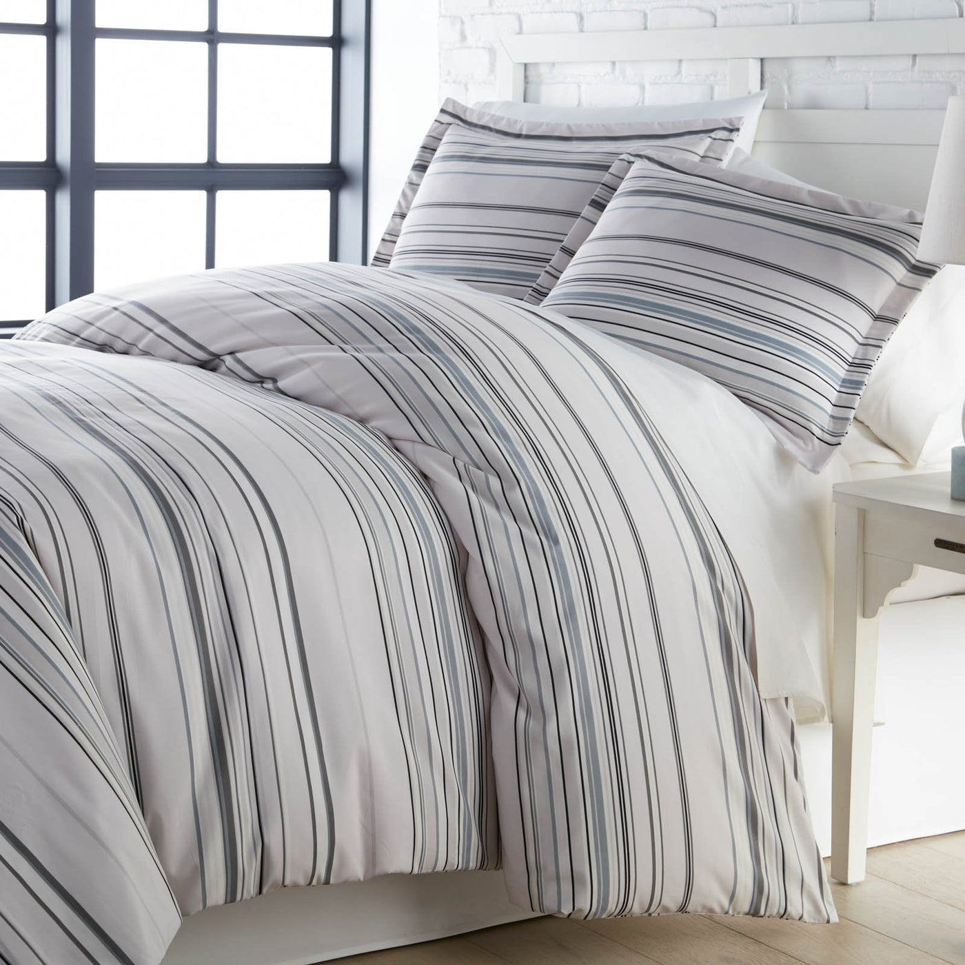 Angled View of Malibu Dreams Duvet Cover Set in Grey#color_malibu-dreams-grey