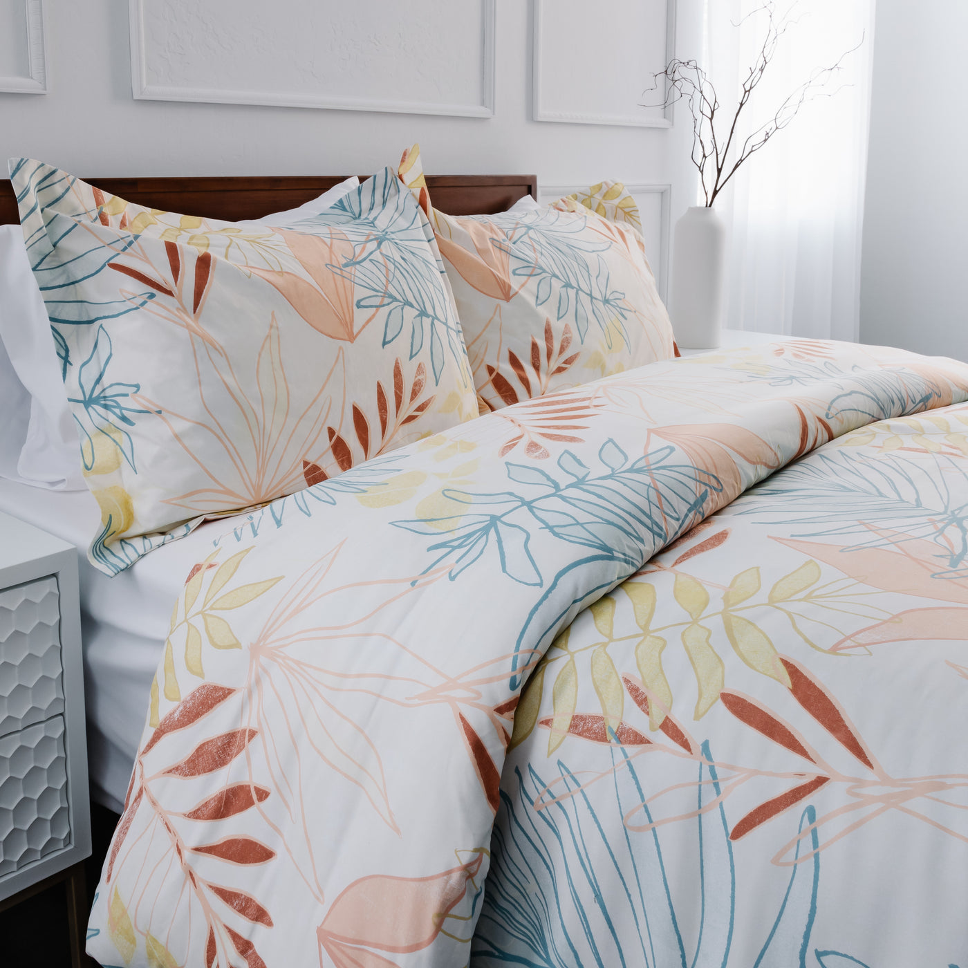 Angled View of Palm Leaf Comforter in cream#color_palm-leaf-cream